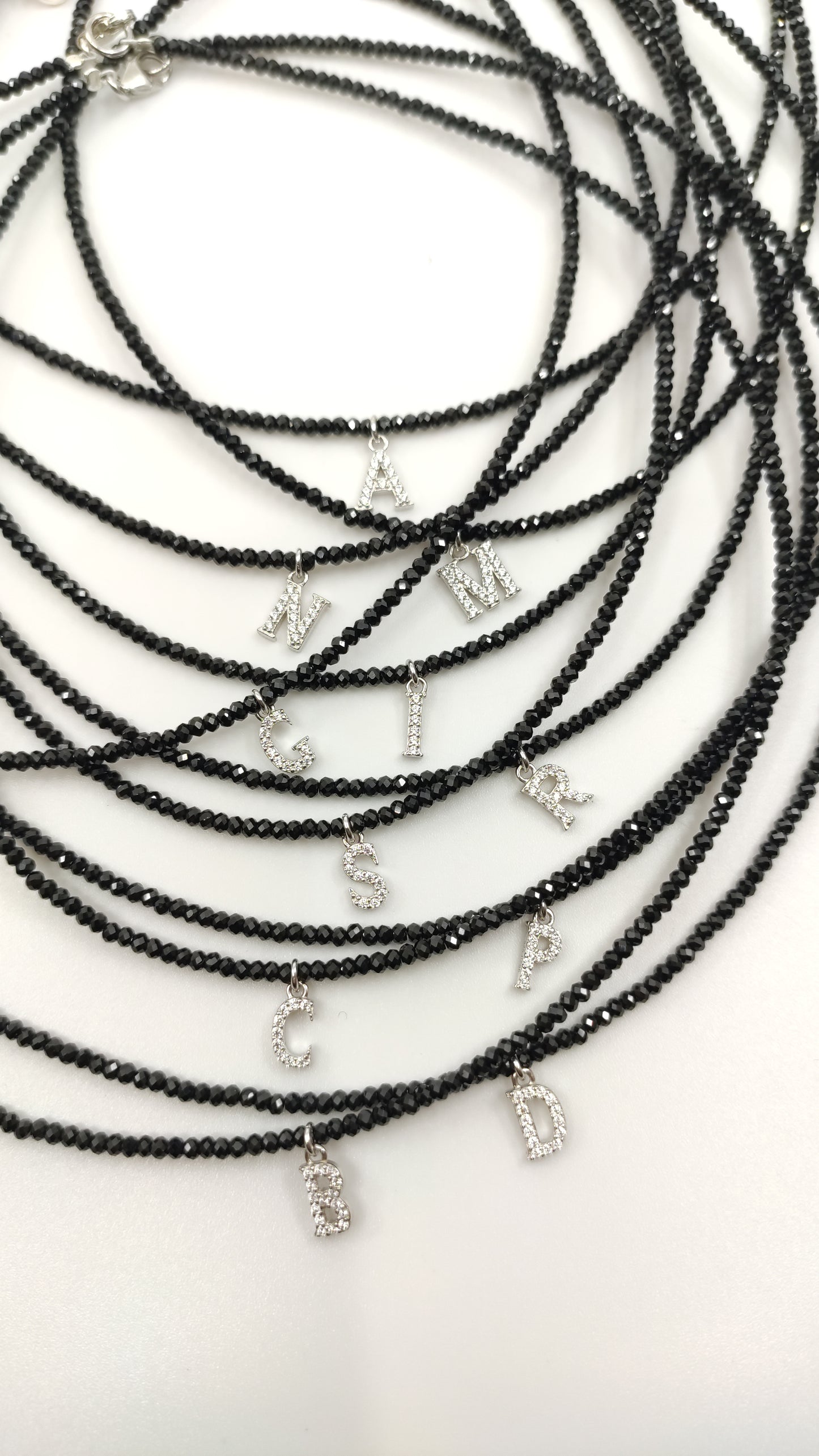 Collar Iniciales plata rodiada.